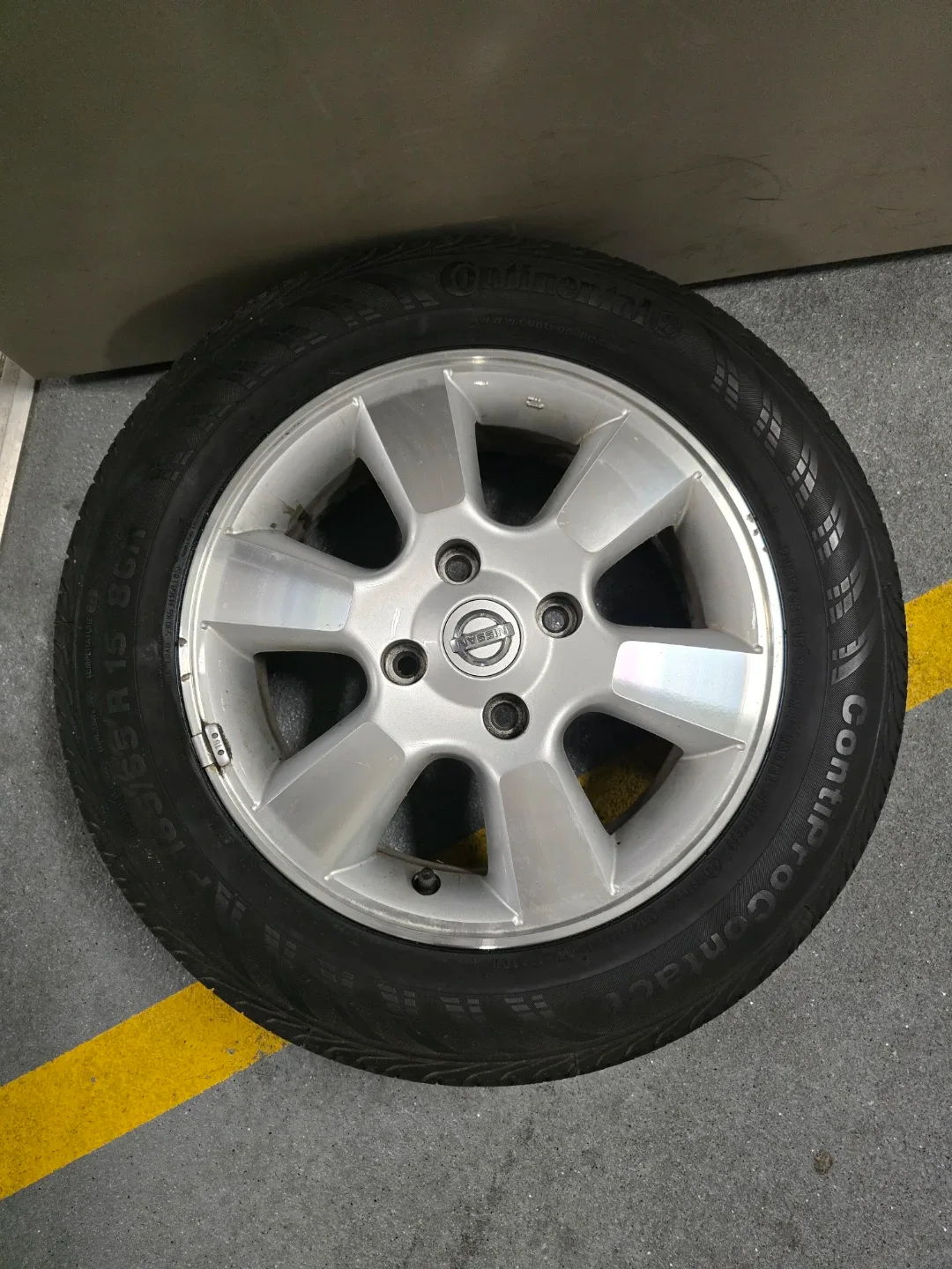 Nissan Wheel with Continental Tire 185/65R15 thumbnail