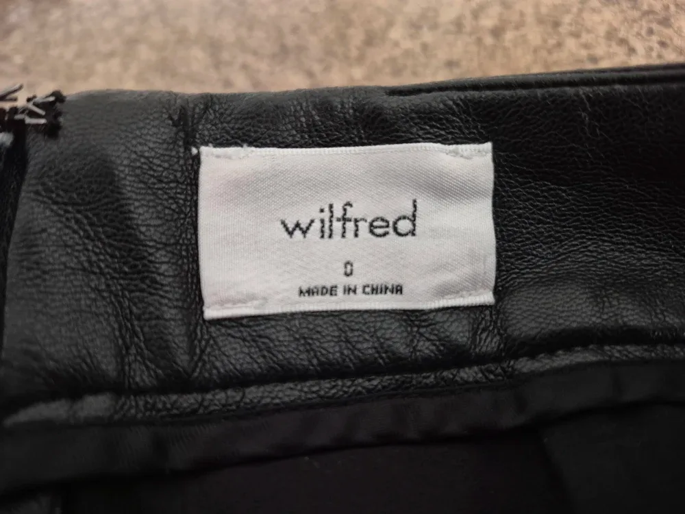 Aritzia Black Leather Mini Skirt image indicator(6)