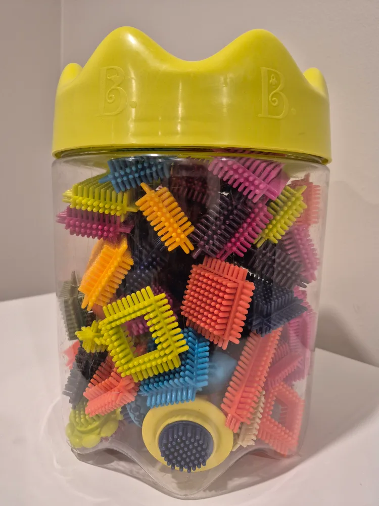 B. toys Bristle Blocks in Container