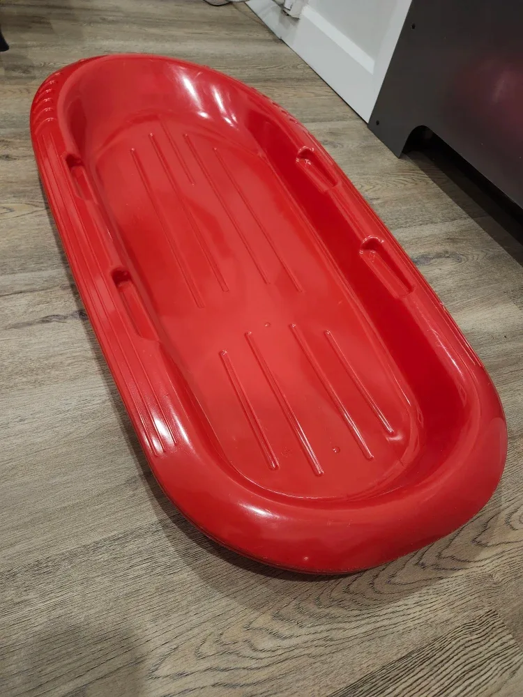 Red Plastic Toboggan Sled