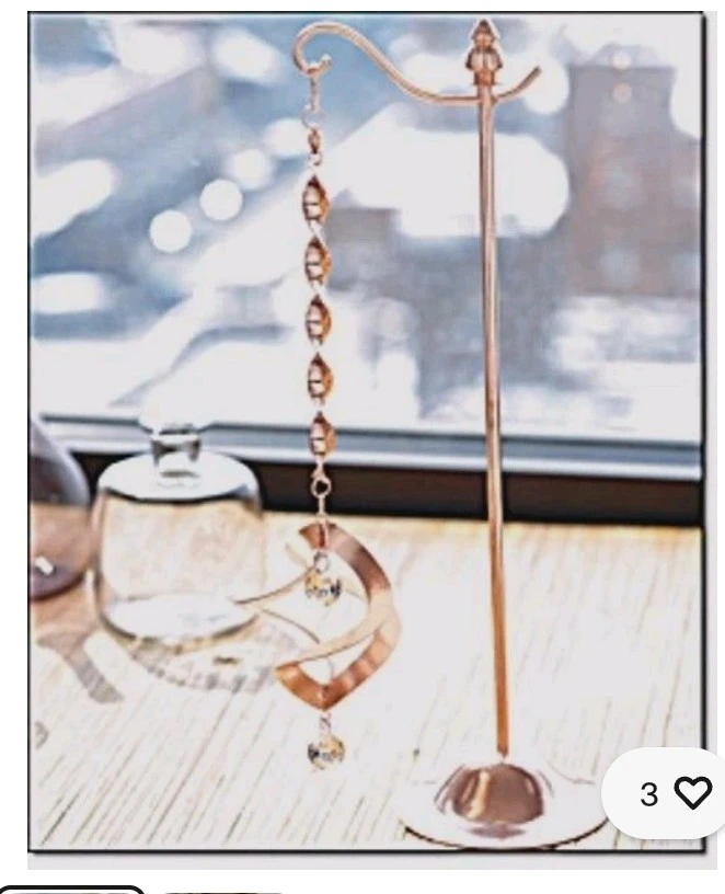 NIB!! AVON WELLNESS FENG SHUI BRONZE SPINNING LIGHT CATCHER
