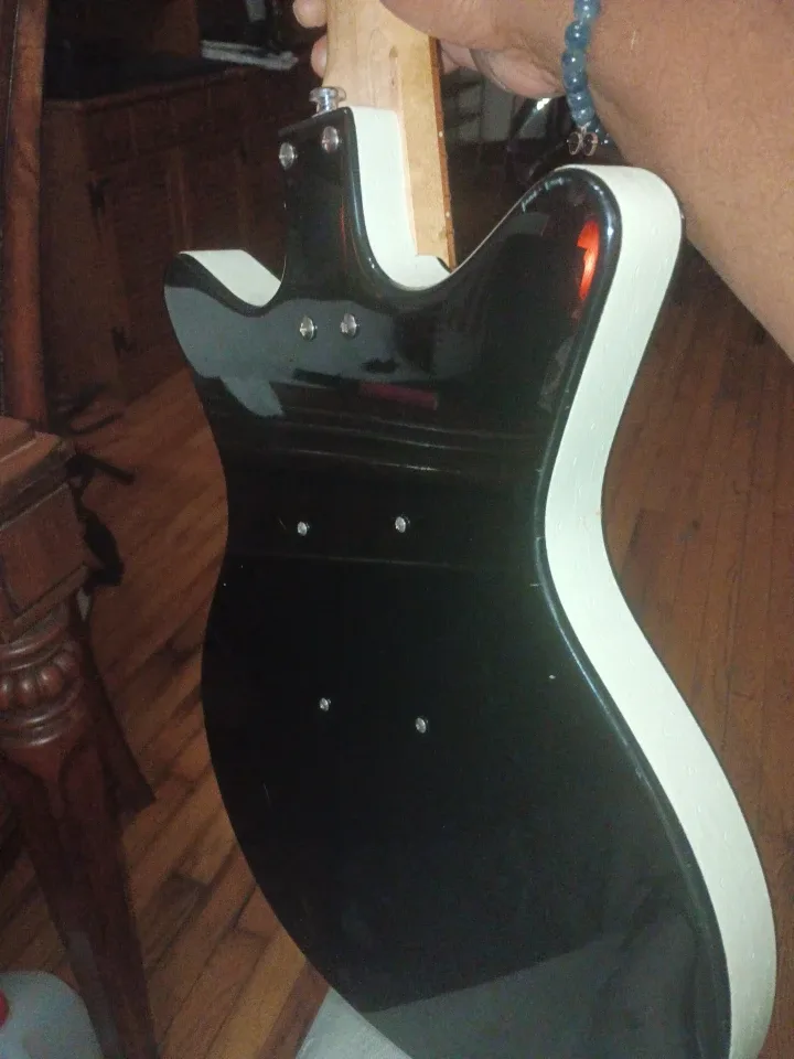 Danelectro lead guitar! Includes amplifier, foot pedal, etc! image indicator(2)