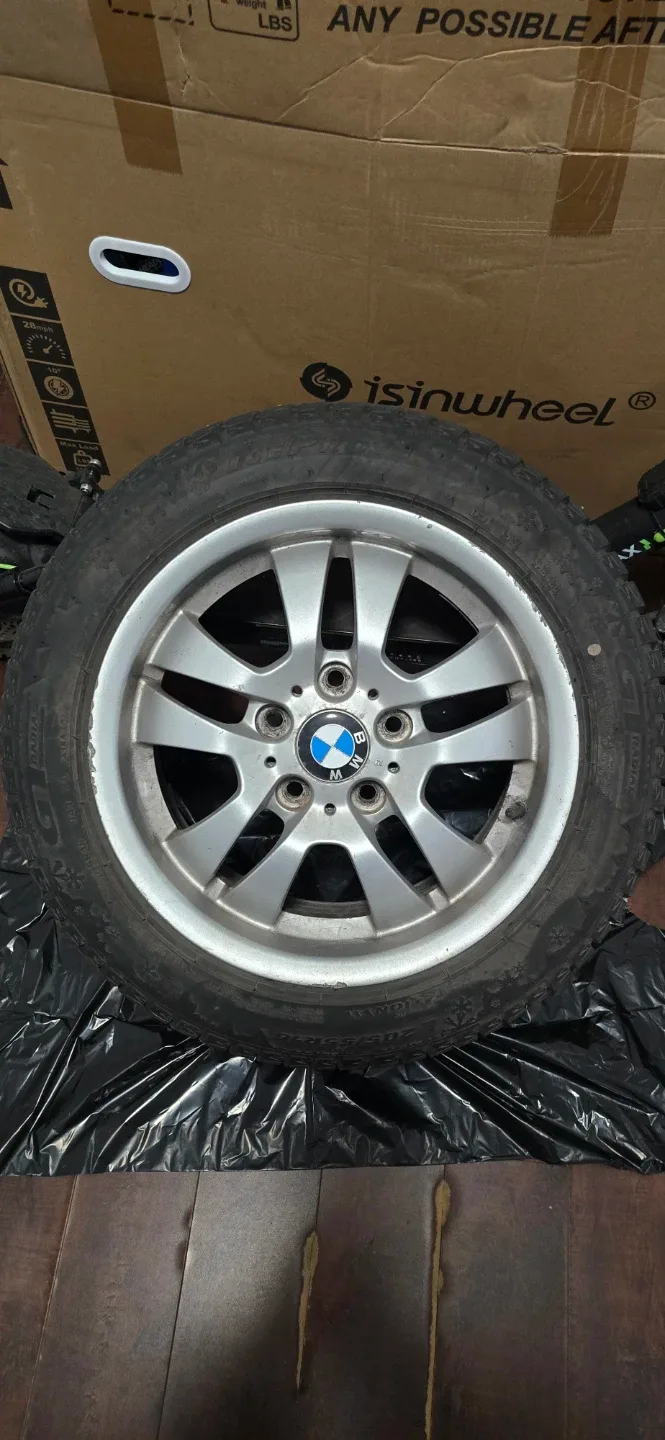 BMW Wheel with 205/55R16 studed tires. image indicator(4)