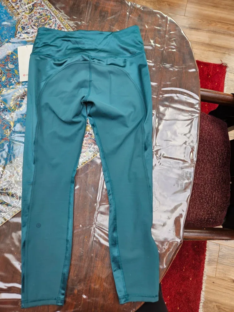 Lululemon Wunder Train HR Tight 25" Size 8 image indicator(3)