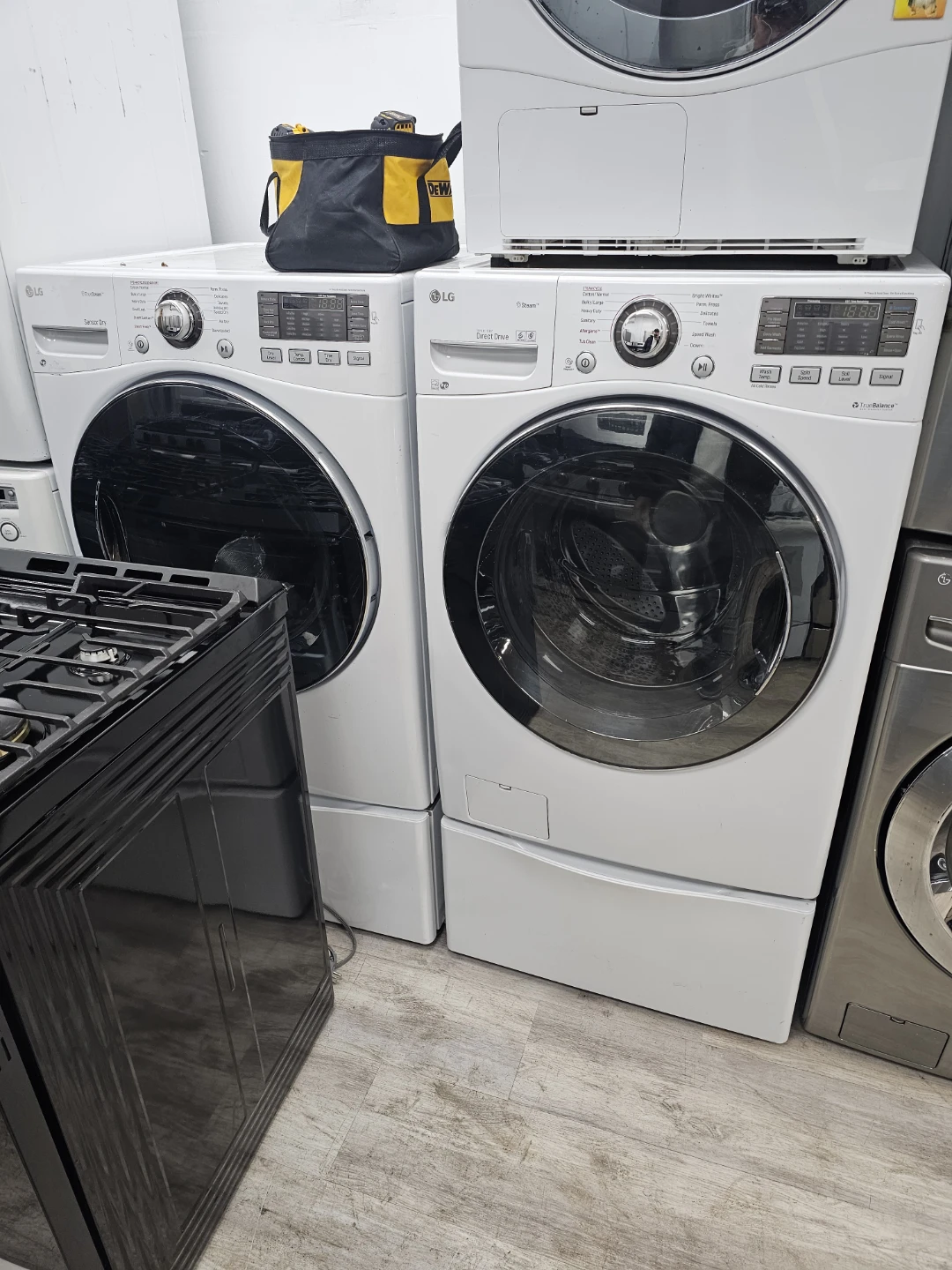 LG washer and dryer set with pedestals