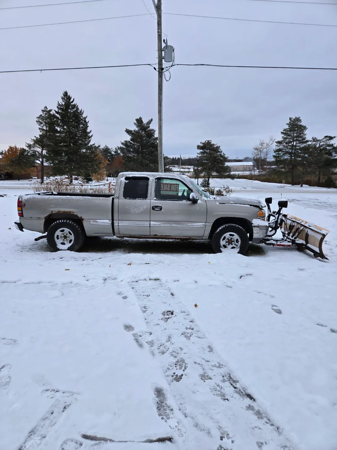 GMC Sierra Truck with Snow Plow