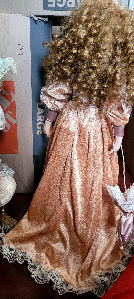 Porcelain Doll in Peach Dress