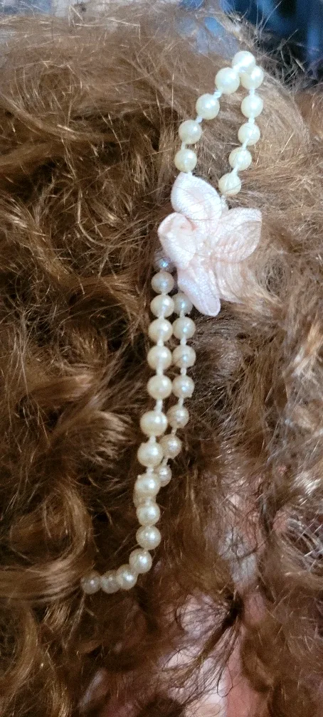 Porcelain Doll in Peach Dress image indicator(2)