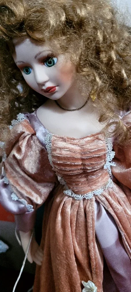 Porcelain Doll in Peach Dress image indicator(4)