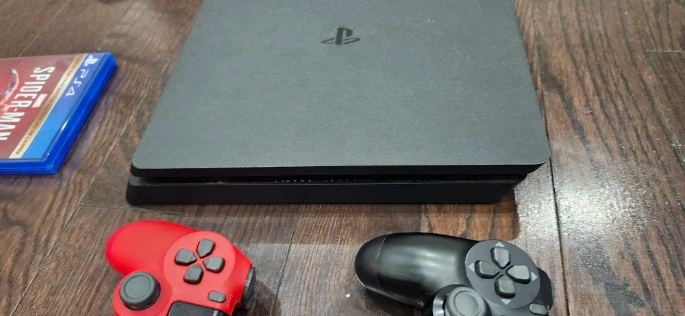 PlayStation 4 Slim with Red Controller & Spider-Man Game image indicator(4)