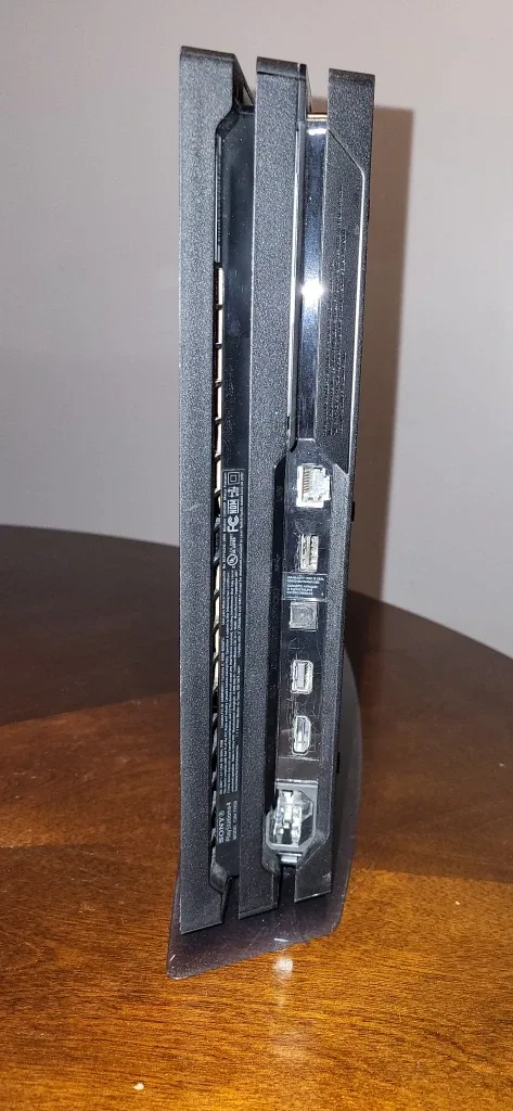 Playstation 4 Pro 1 TB with Vertical Stand & 2 Controllers image indicator(5)