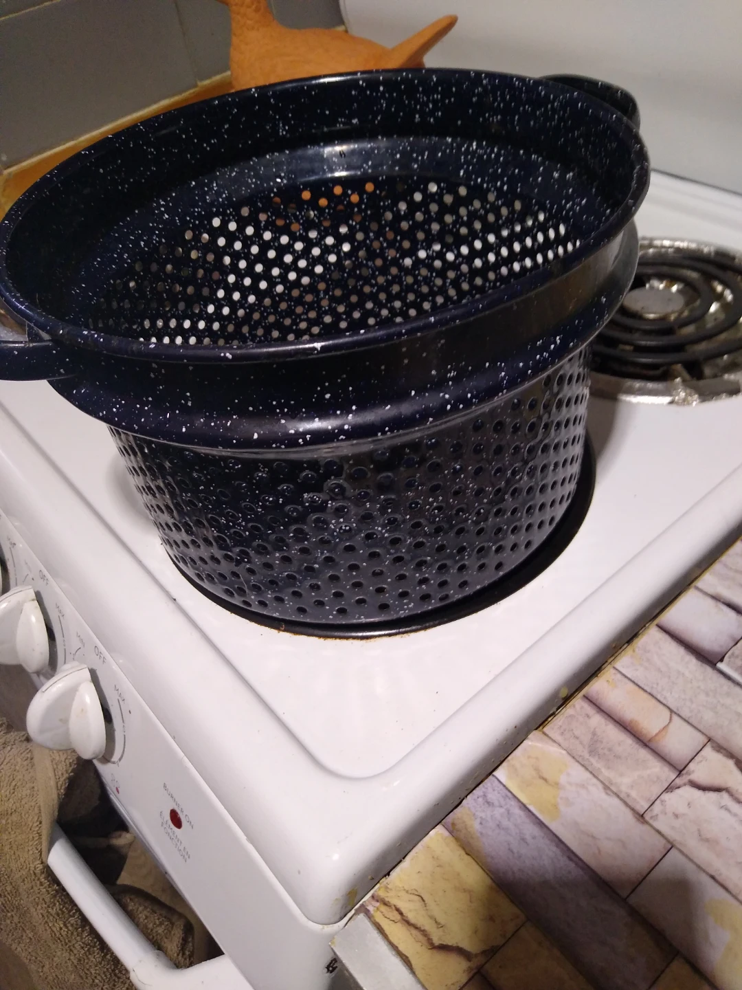 Vintage enamel strainer