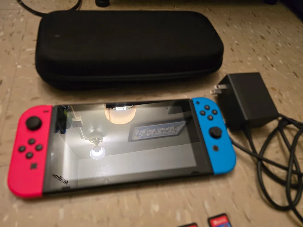 Nintendo Switch with 9 Games and Case