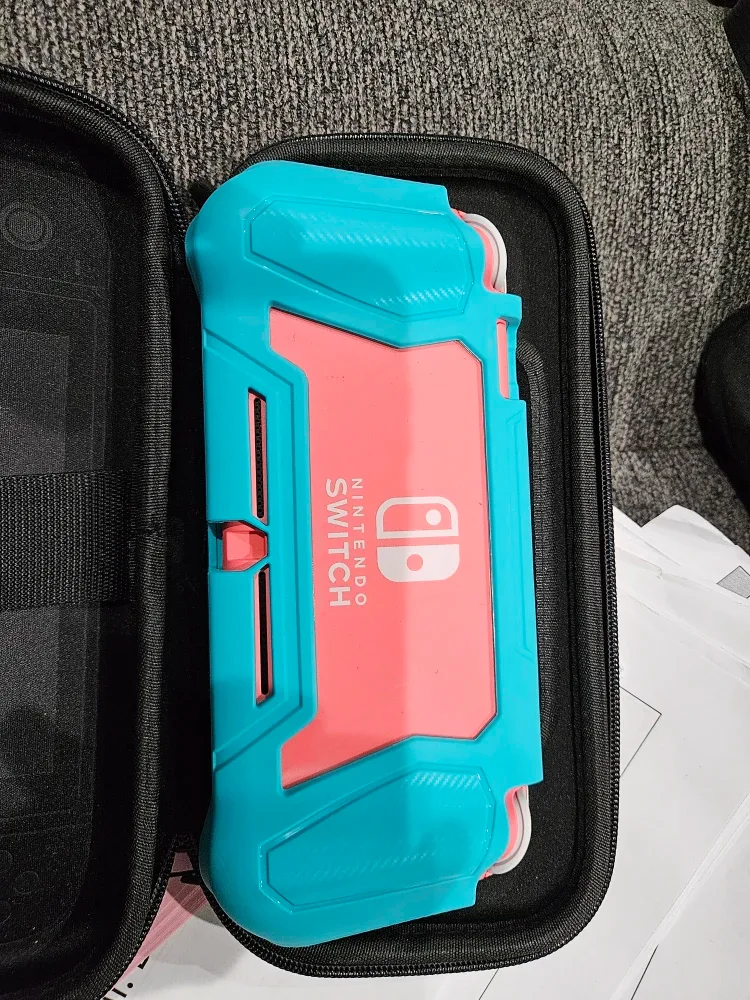 Turquoise Nintendo Switch Lite with Case image indicator(2)
