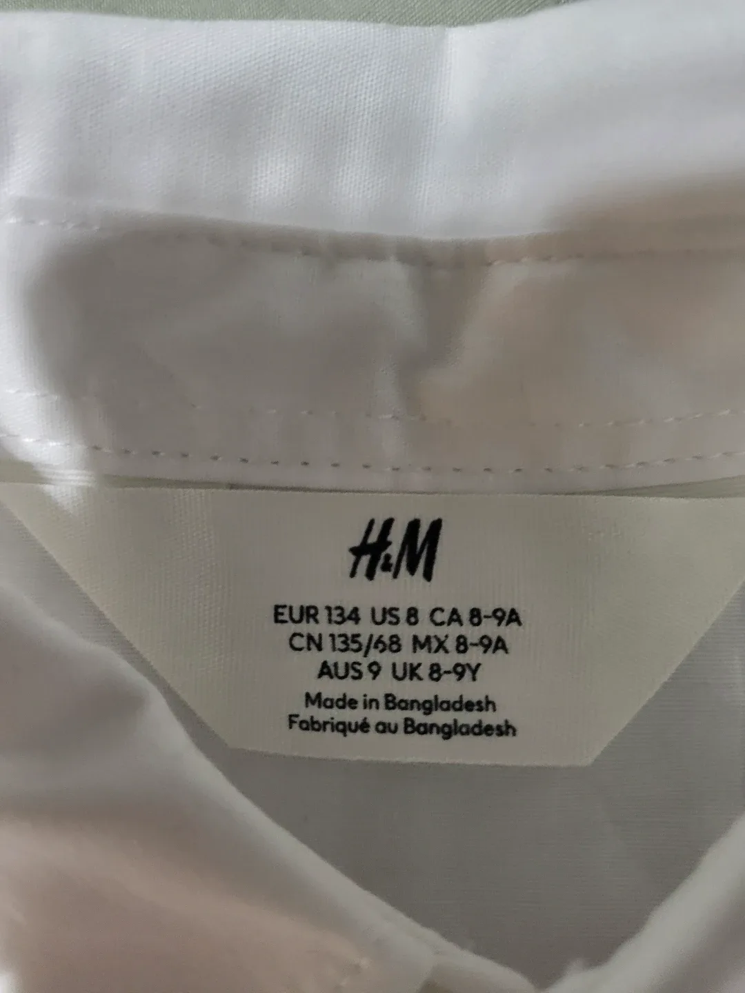 H&M White Button-Up Shirt, Size 8 image indicator(2)