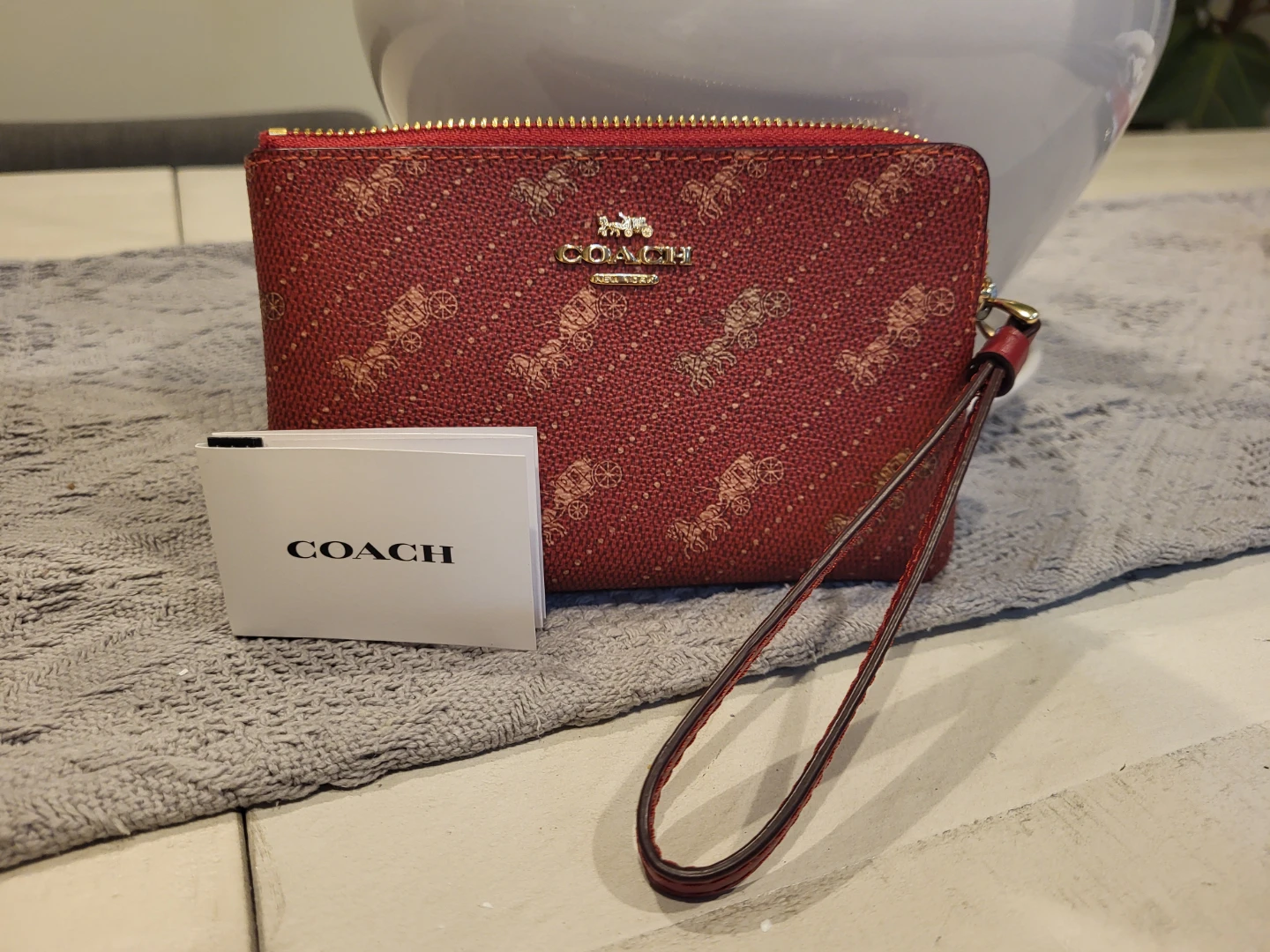 Coach Wristlet - Red Horse & Carriage Print