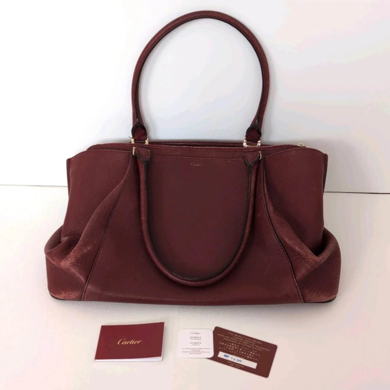 Cartier Burgundy Red Spinel Taurillon Bull Leather Handbag