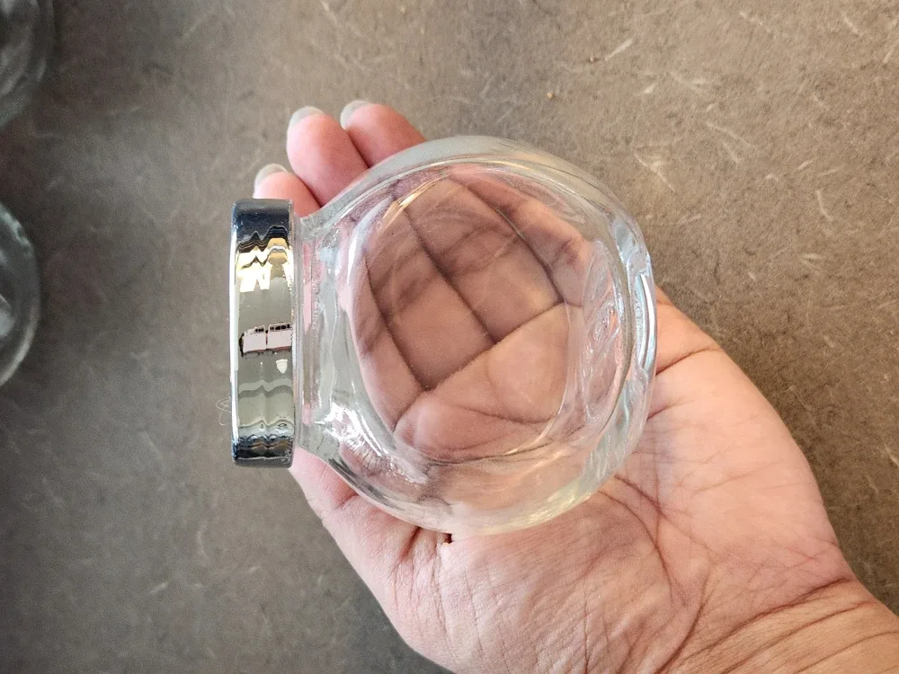 4 Glass Jars with Silver Lids image indicator(2)