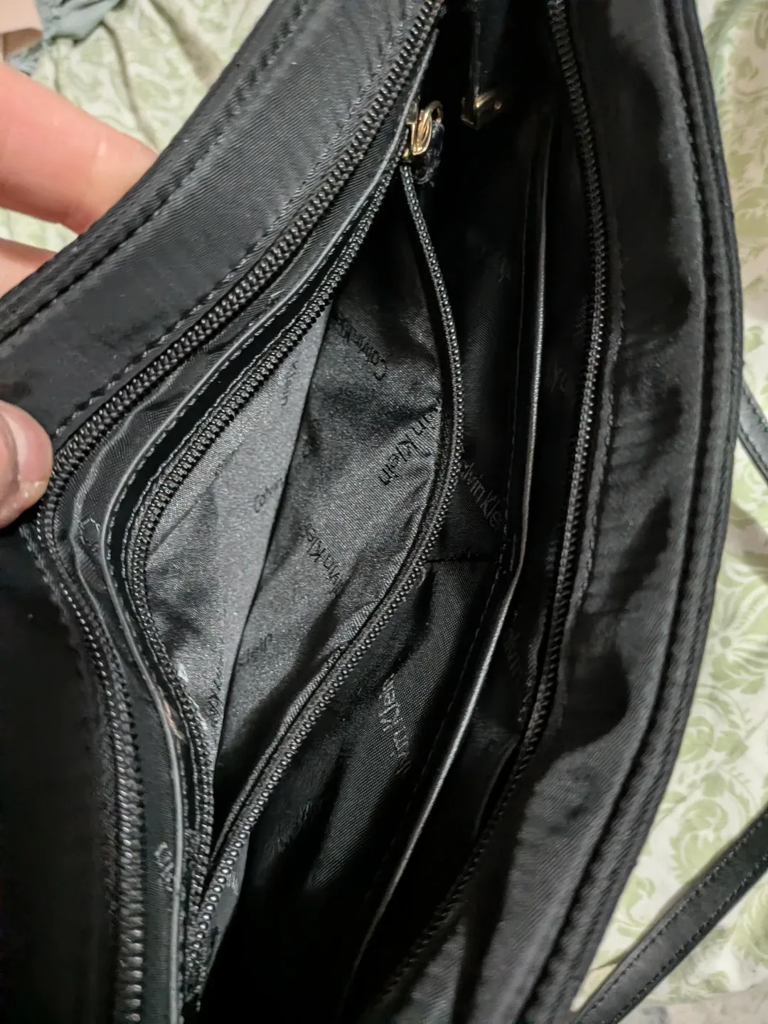 Calvin Klein black purse with adjustable strap good condition image indicator(5)