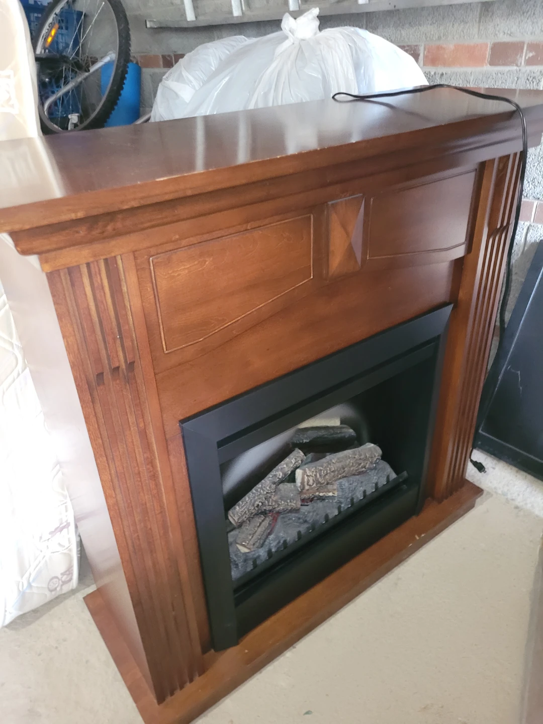 Electric Fireplace with Wood Mantel