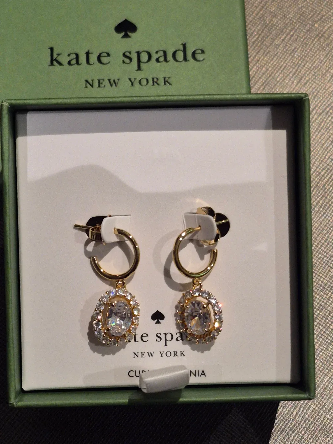 Kate Spade Victoria Gold Clear Huggie Earrings image indicator(5)