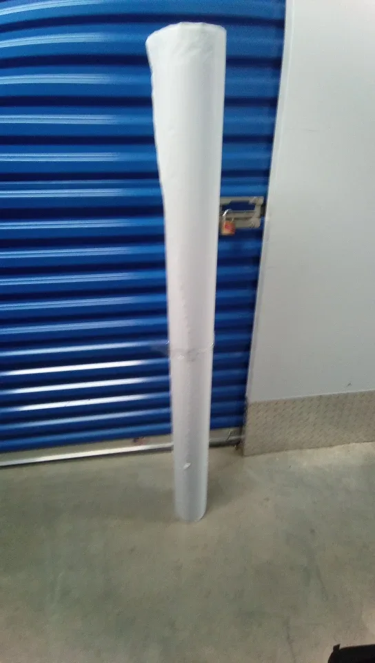 Hude 4' roll of glossy one side paper. ~~15 yards(30")