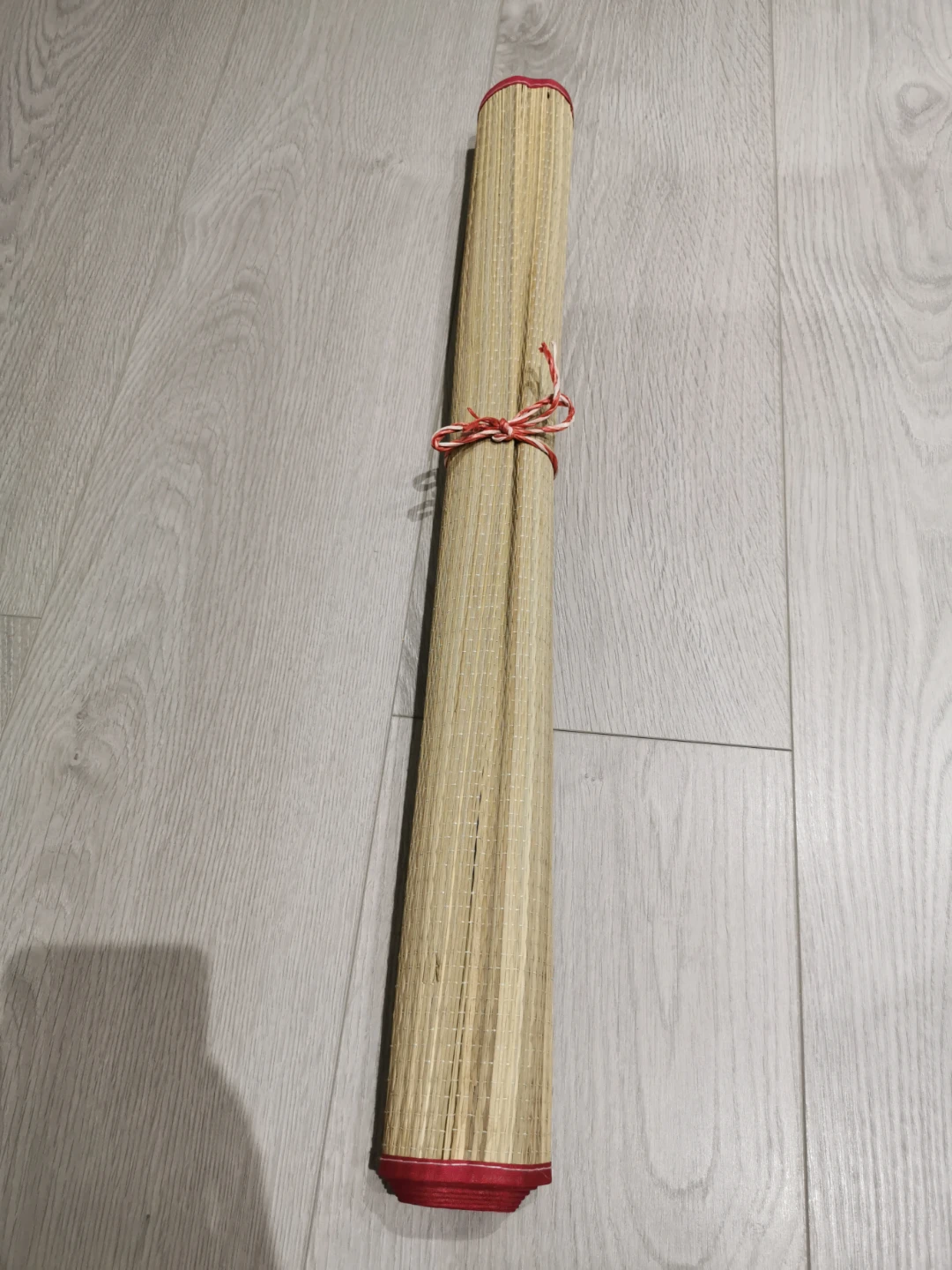 Woven Straw Mat with Red Border