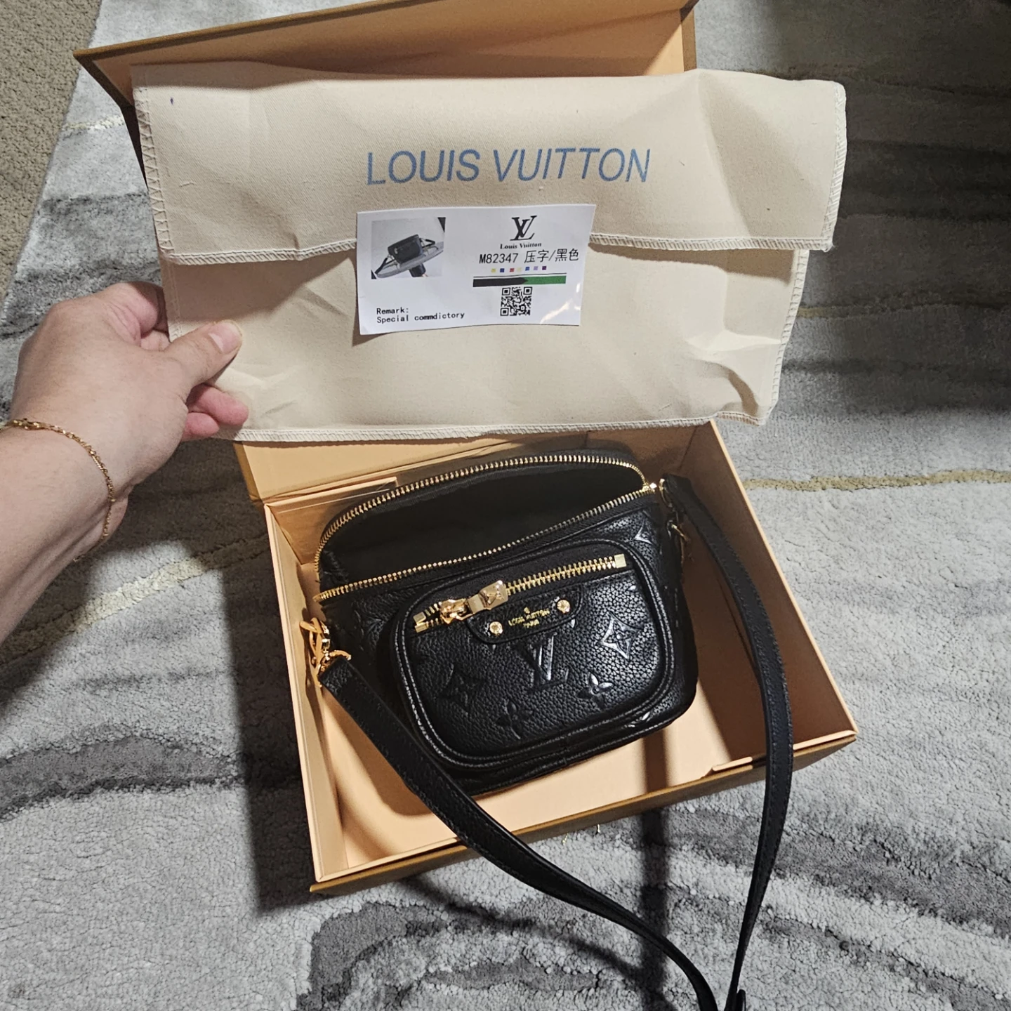 Louis Vuitton Embossed Leather Bum Bag - Black