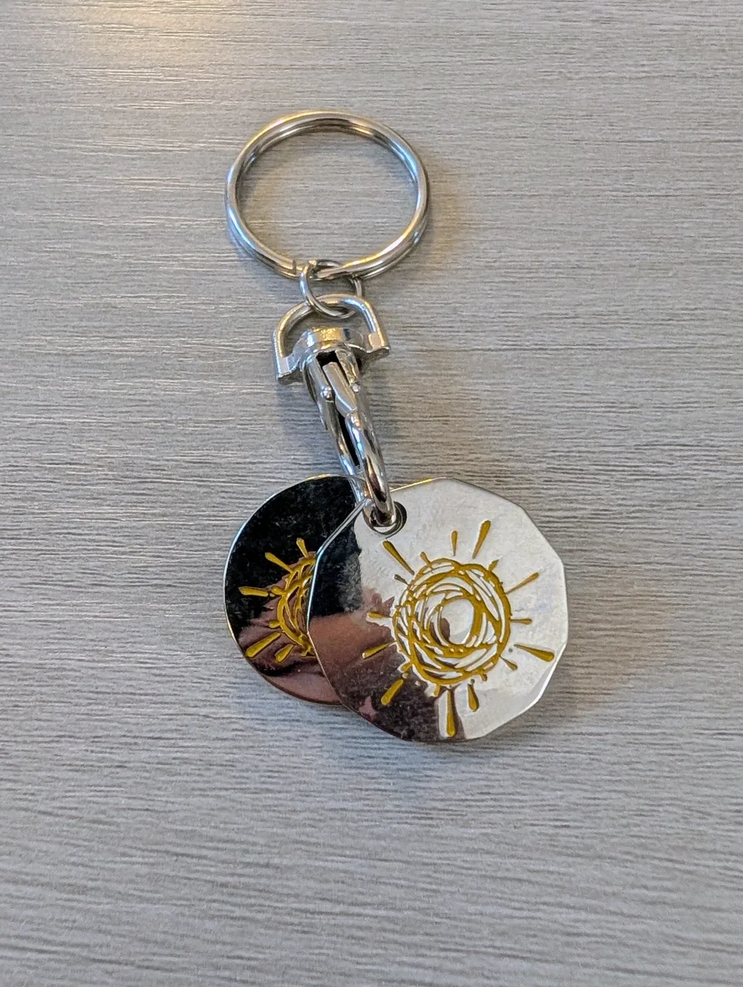 Brand New Silver Keychain with Sun Design