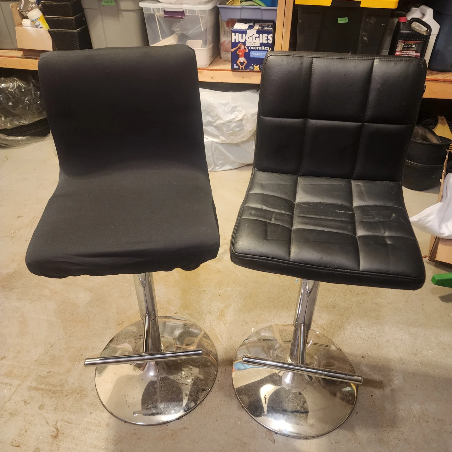 Two Black Bar Stools with brand new covers