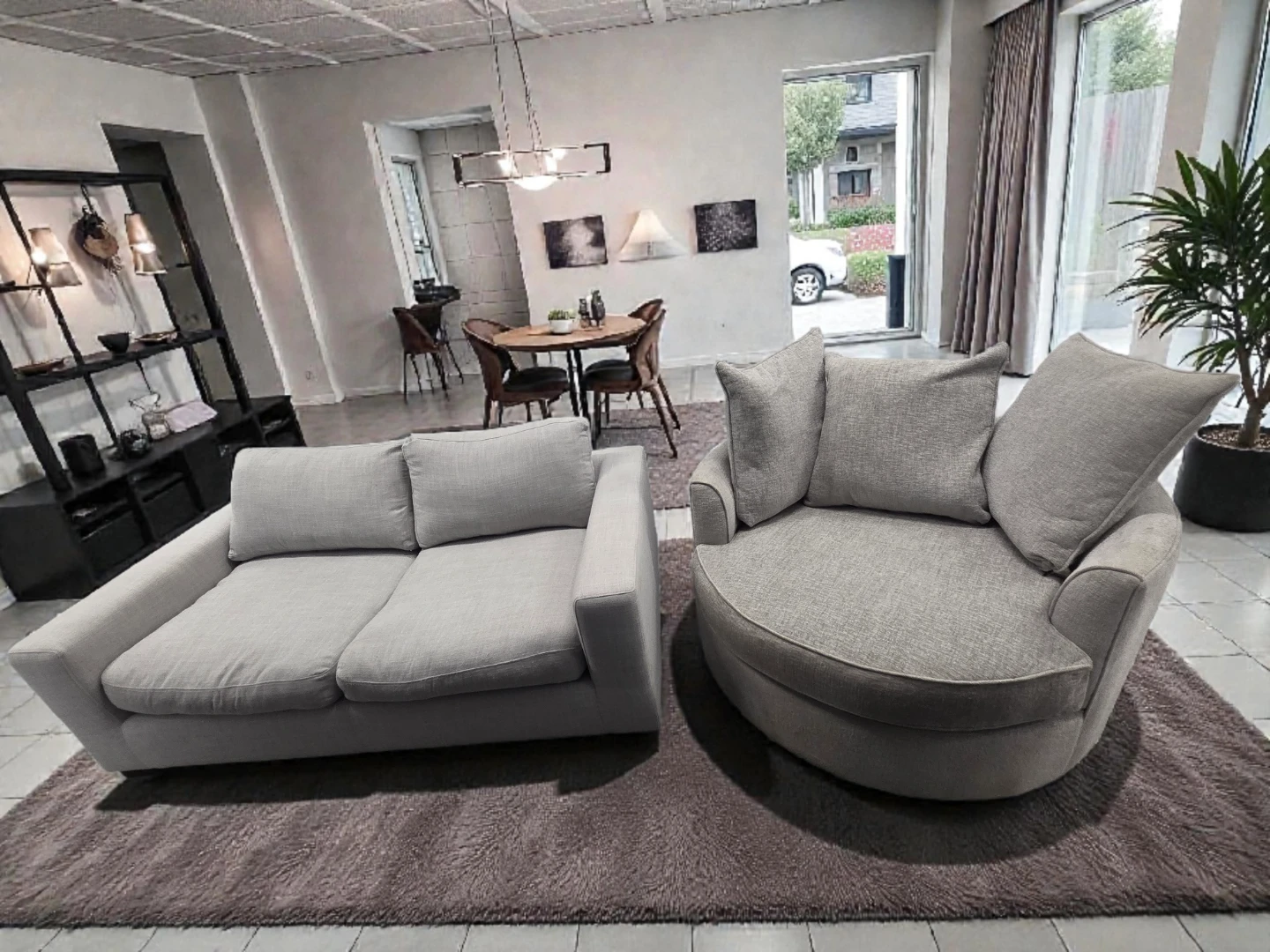 Grey Swivel Chair with Pillows