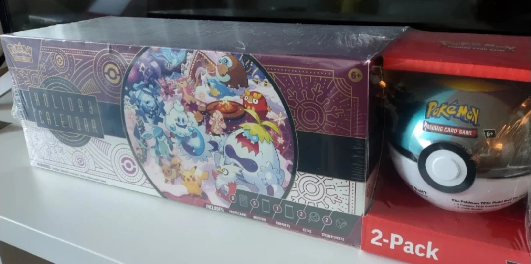 New Pokémon Holiday Calendar & Poké Ball Tin 2-Pack - photo 2