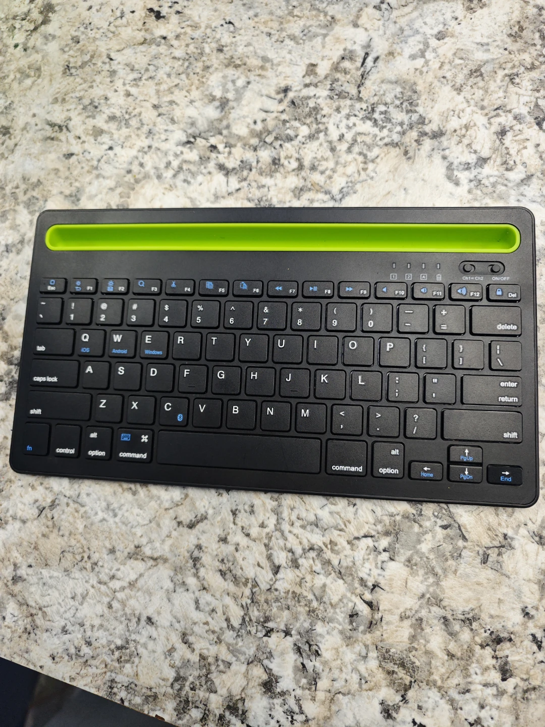 Black Wireless Keyboard with Green Accent
