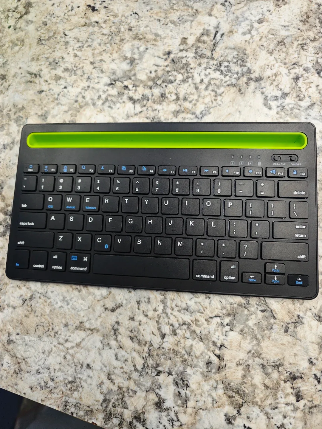 Black Wireless Keyboard with Green Accent