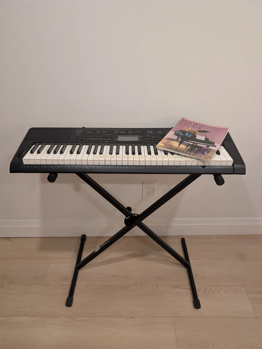 Casio Keyboard with Stand and Beginner Course Book