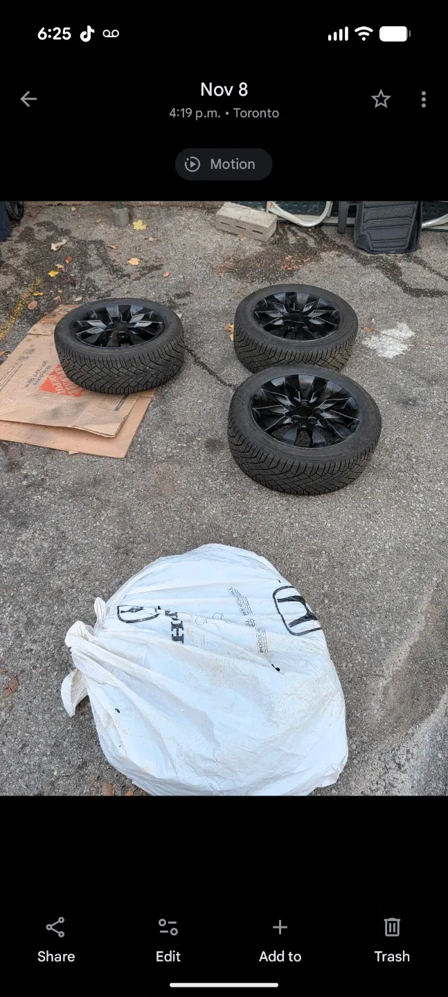 Continental VikingContact7 4 Winter tires with Rims on.