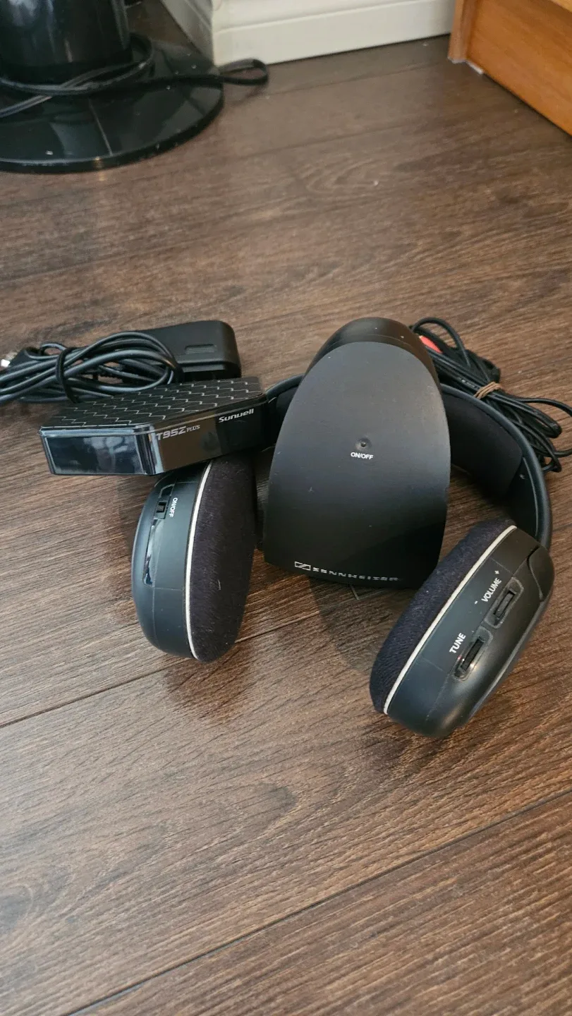 Panasonic TV , wireless headphones, a box with remote box image indicator(2)