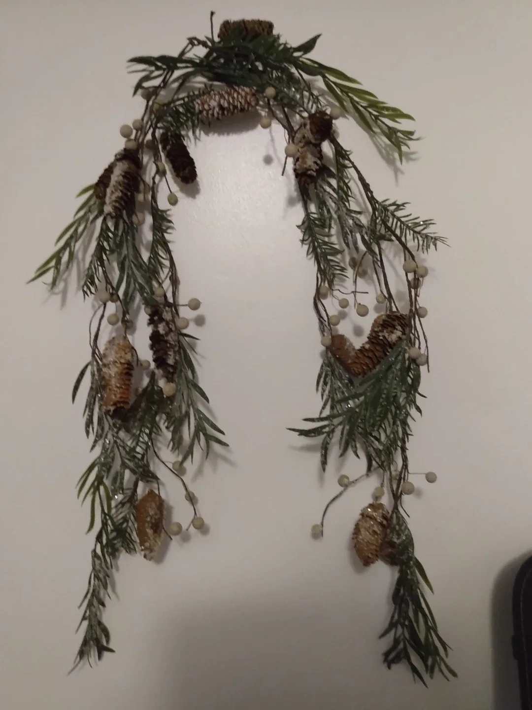 Christmas Garlands with beig berries, pine cones