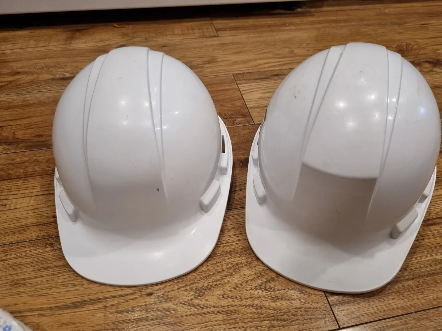 Two White Hard Hats