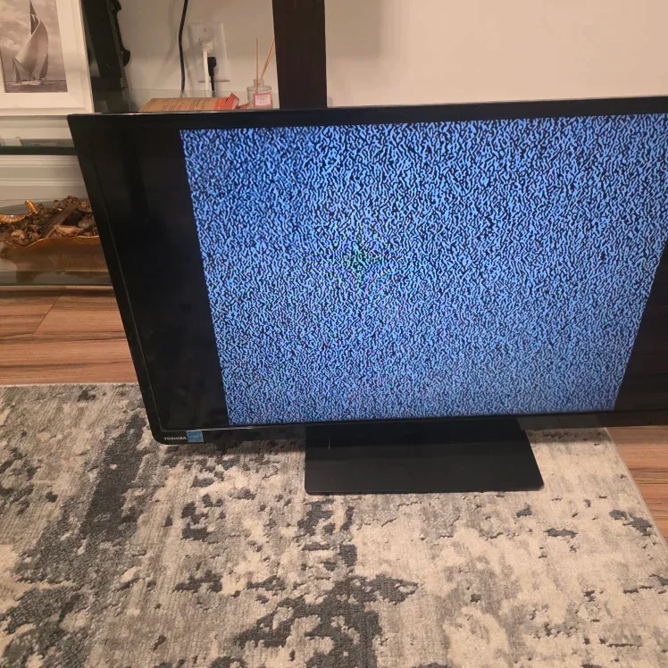 Toshiba 32L1400UC 32" TV image indicator(2)