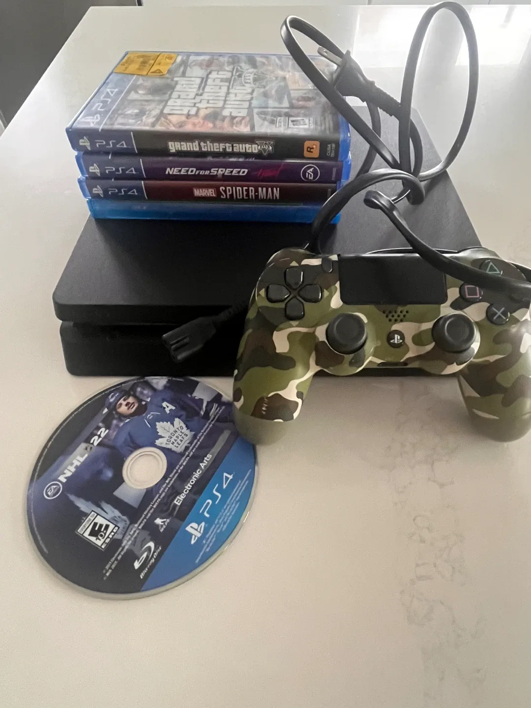 PlayStation 4 with Controller & Games