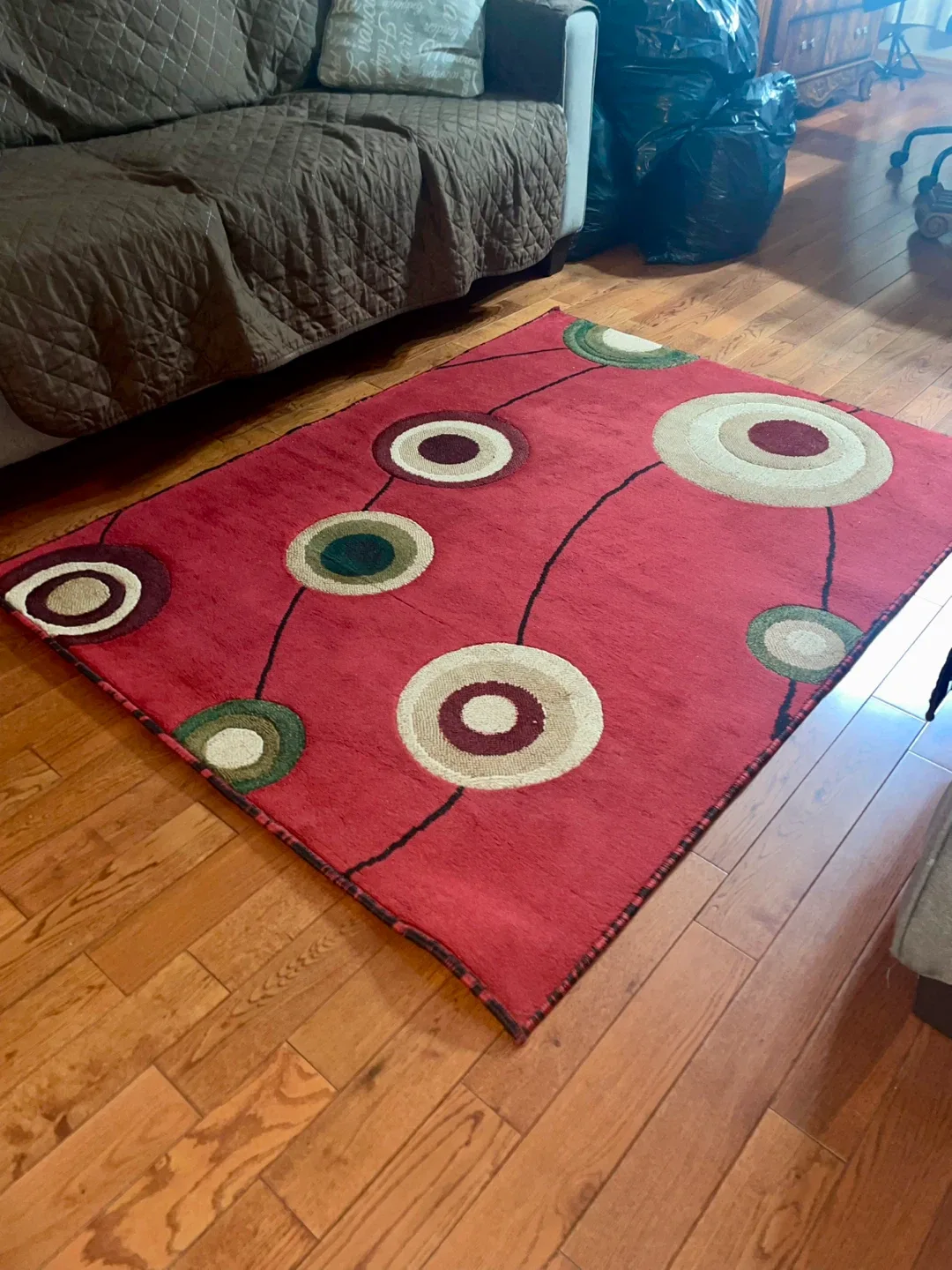 Red Area Rug with Circle Design