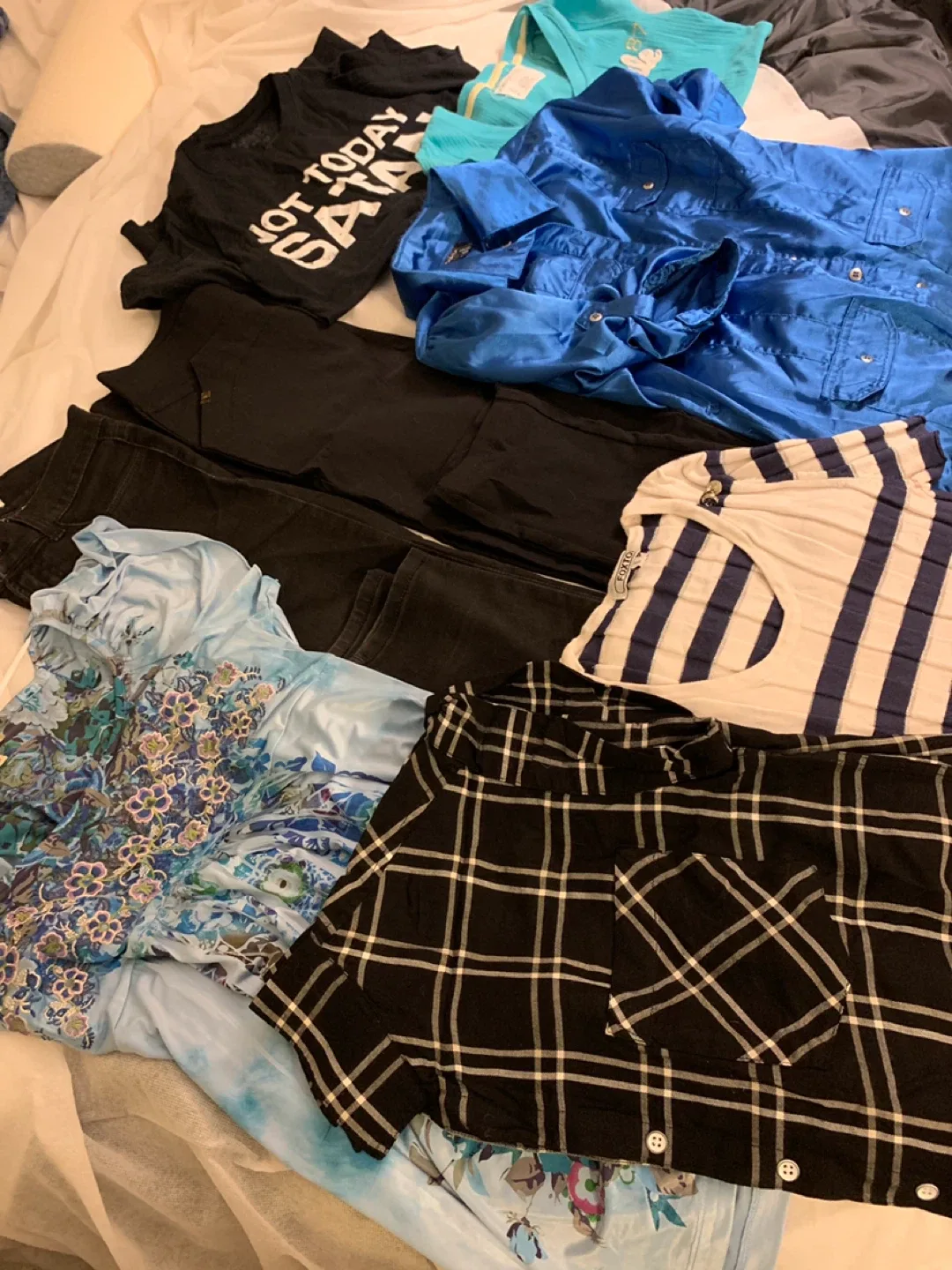 #7.  Assorted Women's Clothing/ size pants 0, tops - s