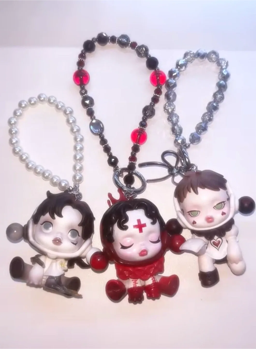 15$ keychains and phone accessories image indicator(2)