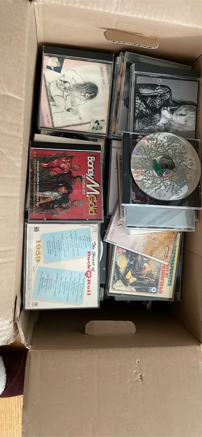Box of Assorted Music CDs