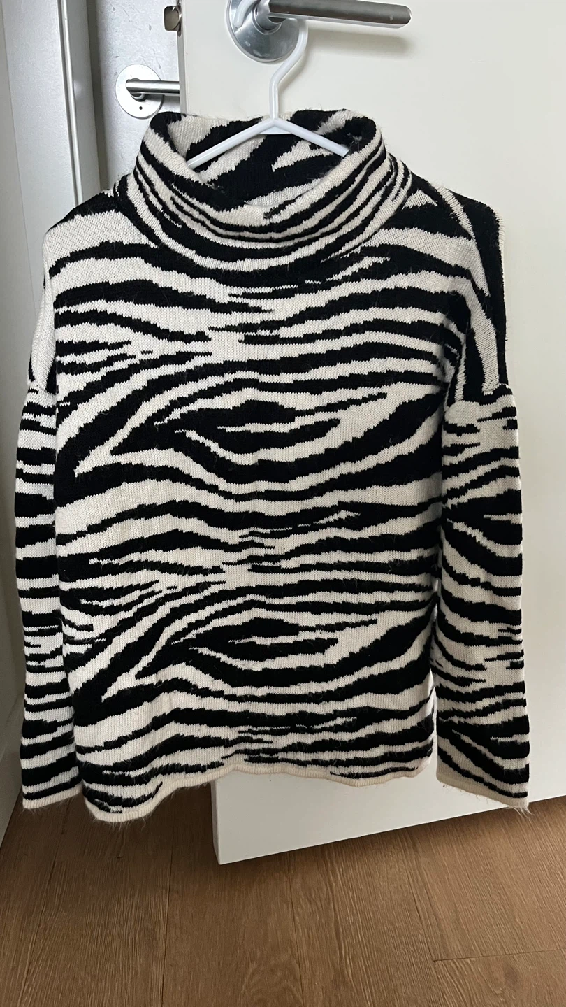 Zebra Print Turtleneck Sweater