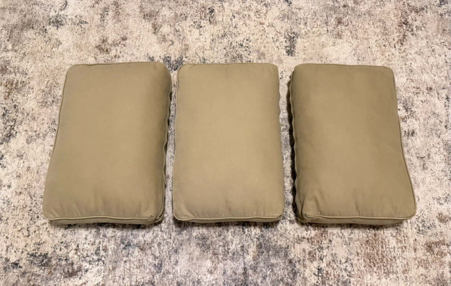 Three Beige Throw Pillows