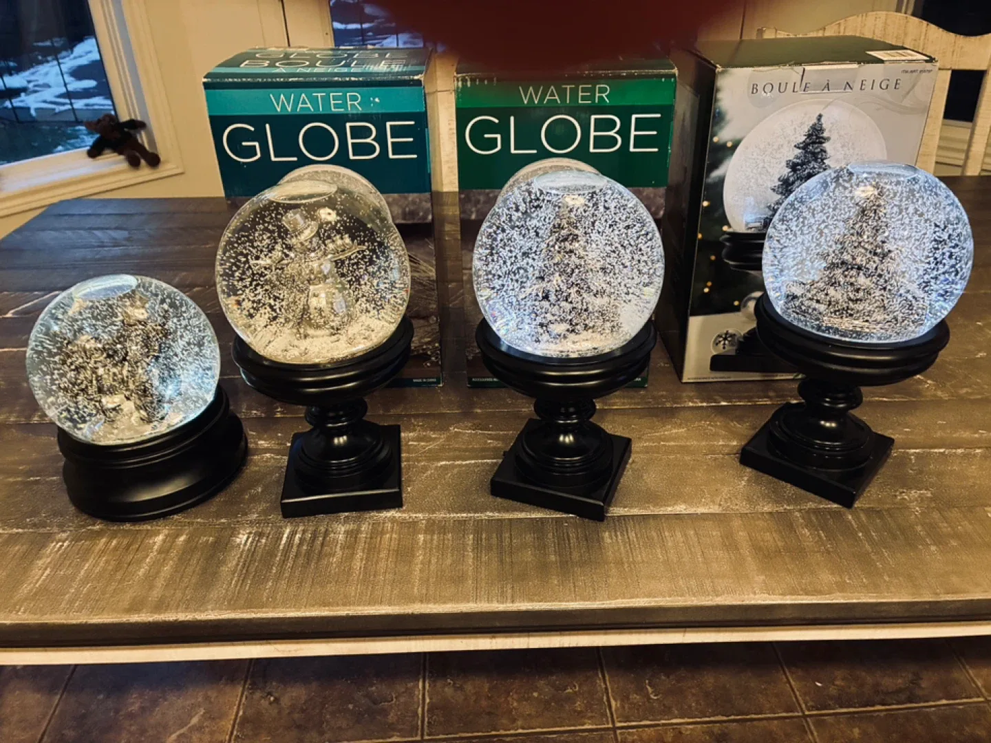 4 Christmas light up snow globes