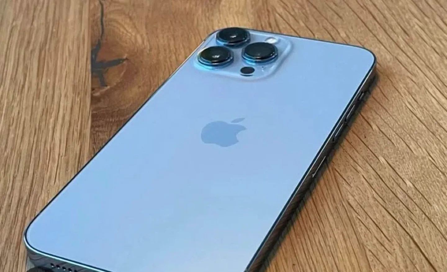 iPhone 13 Pro Max - Light Blue. Including a case