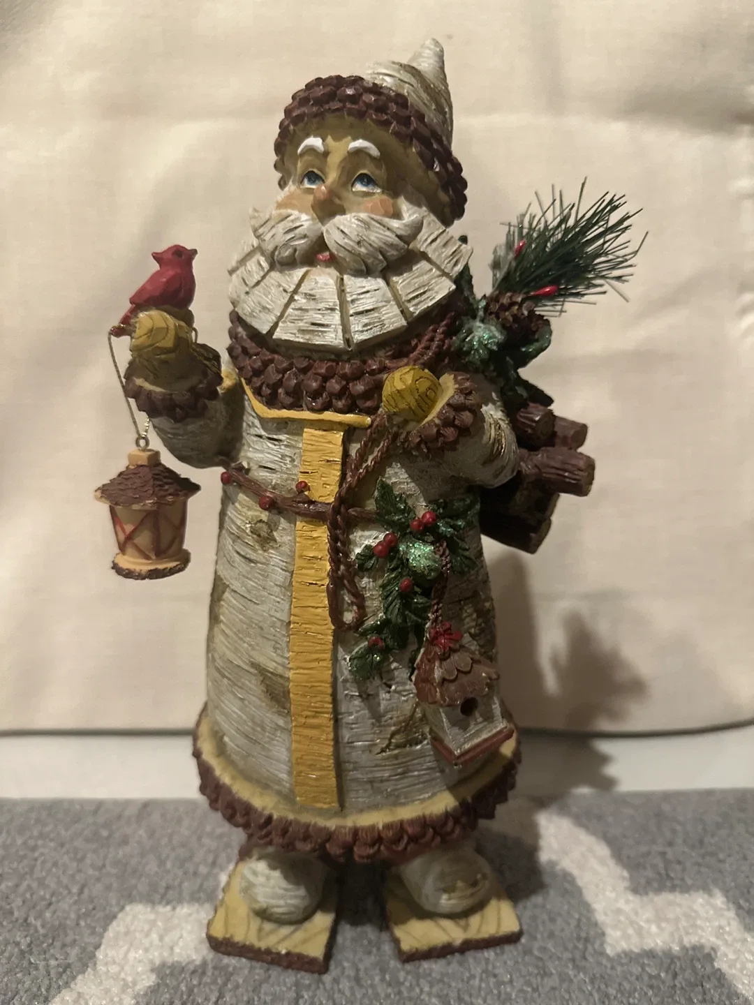 Santa Claus Figurine with Bird and Lantern